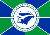 blue-green pinwheel, white disc, blue conch, 34 blue-green stars