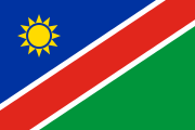 diagonal blue-red-green, white outlines, yellow sun