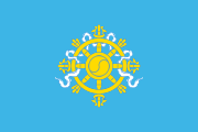 blue, yellow wheel wrapped in a white ribbon
